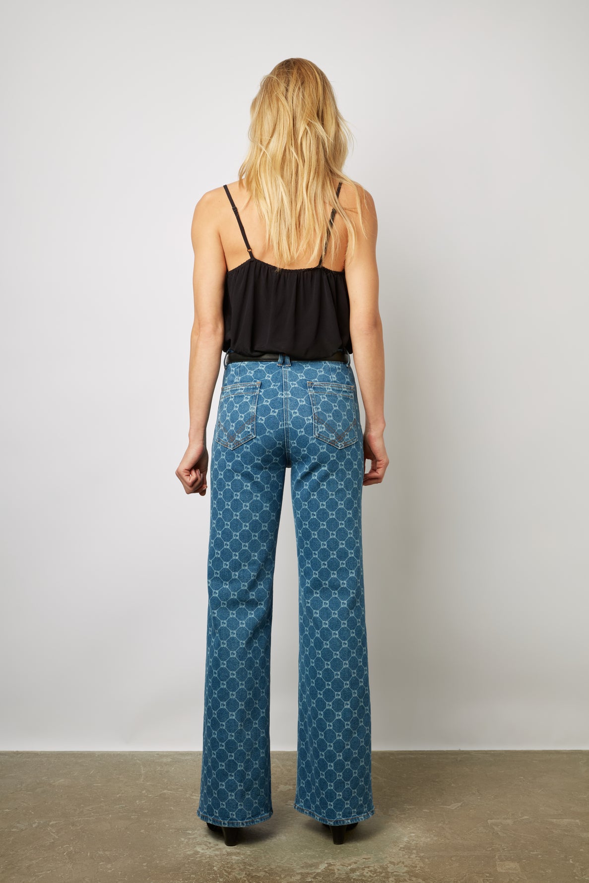 Jean flare à monogramme - ANNA Faume - seconde main