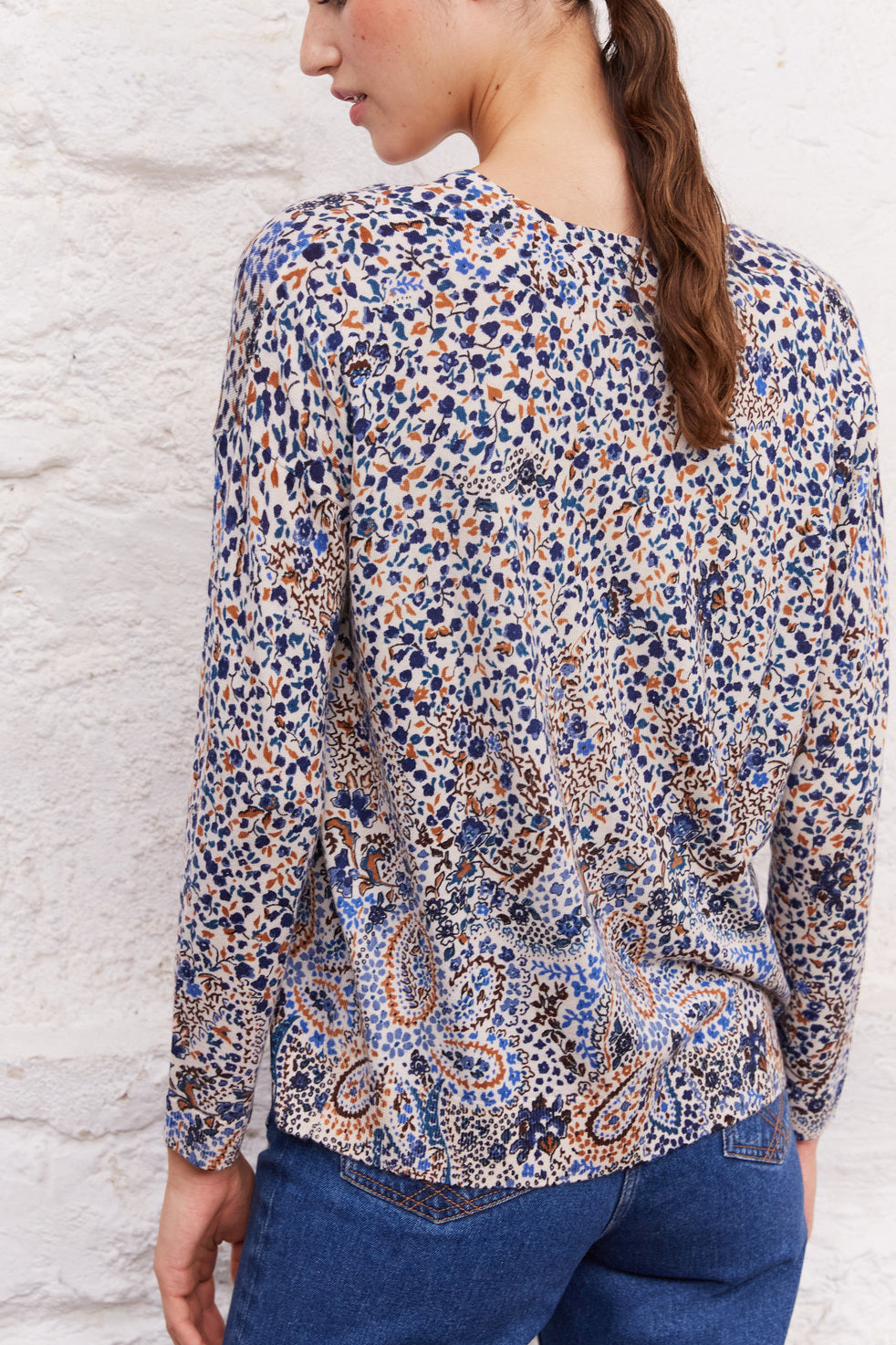 Pull V en laine à l'imprimé fleuri - LIAM Faume - seconde main